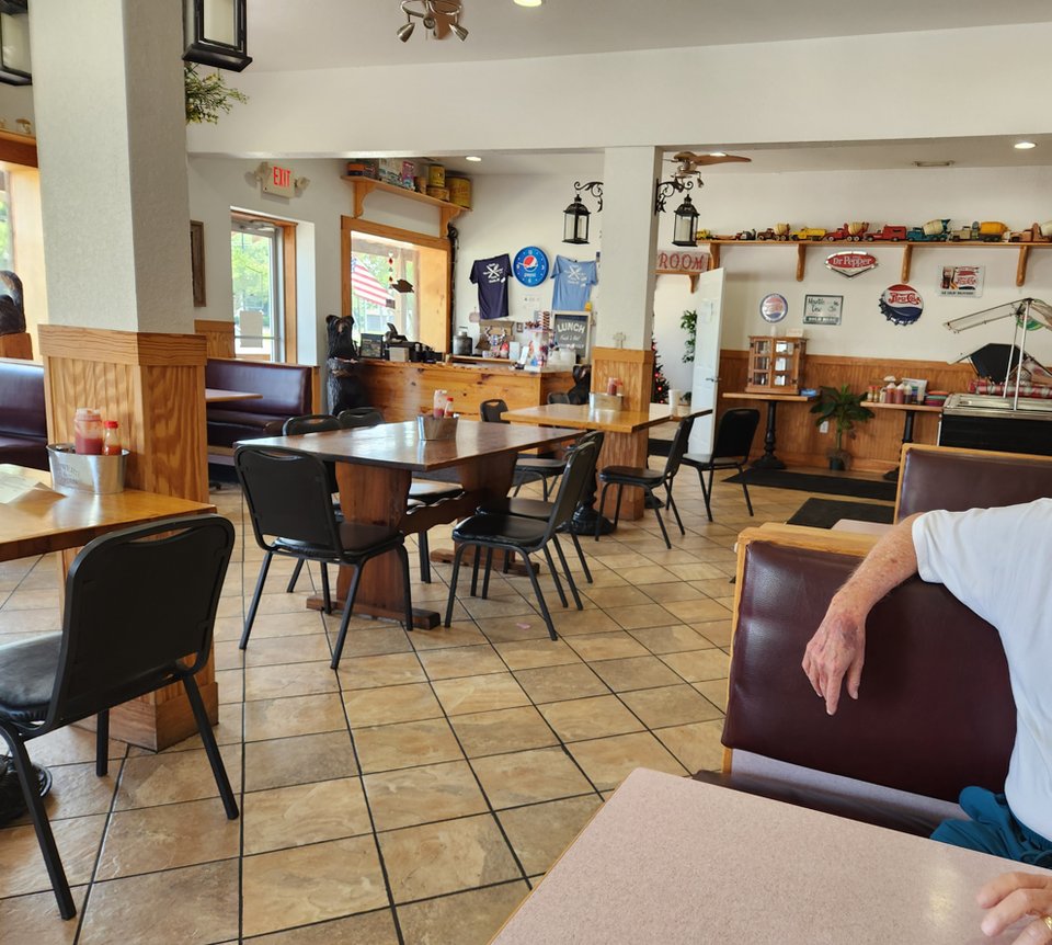 Buffet counter with trays of comfort food.
